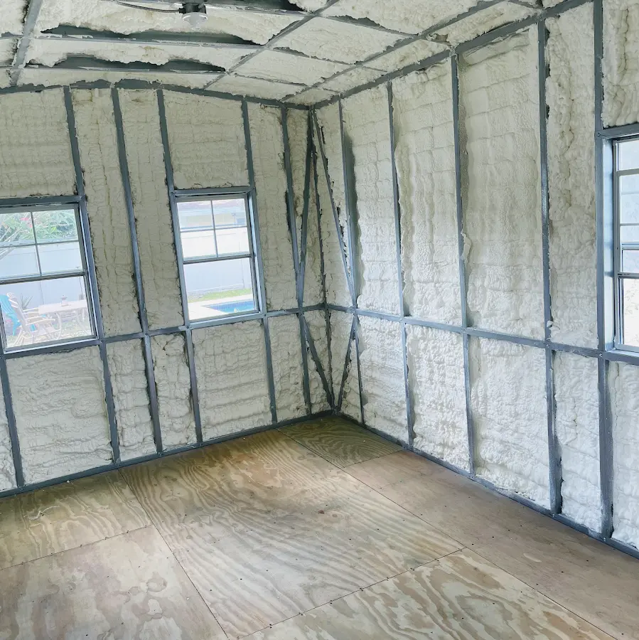Closed-cell spray foam insulation applied to wall cavities in a residential project in Toccoa